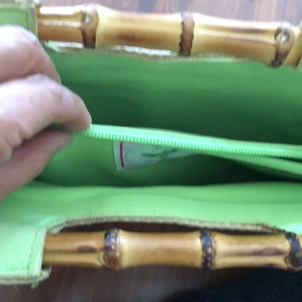 BUZZ by Jane Fox Bamboo handle woven rattan bag.